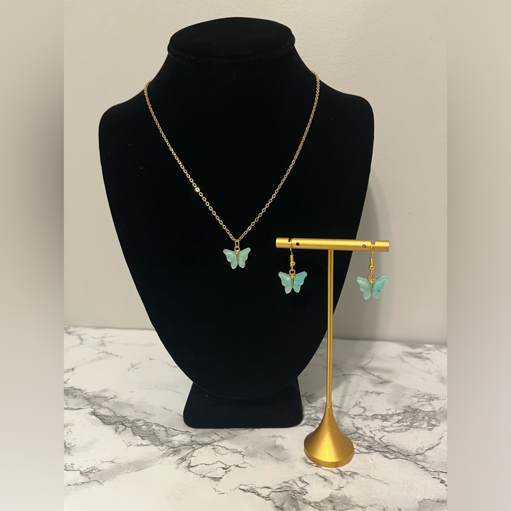 Light blue butterfly necklace and earring set